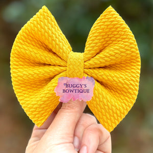 Gold bow/piggies/bow tie